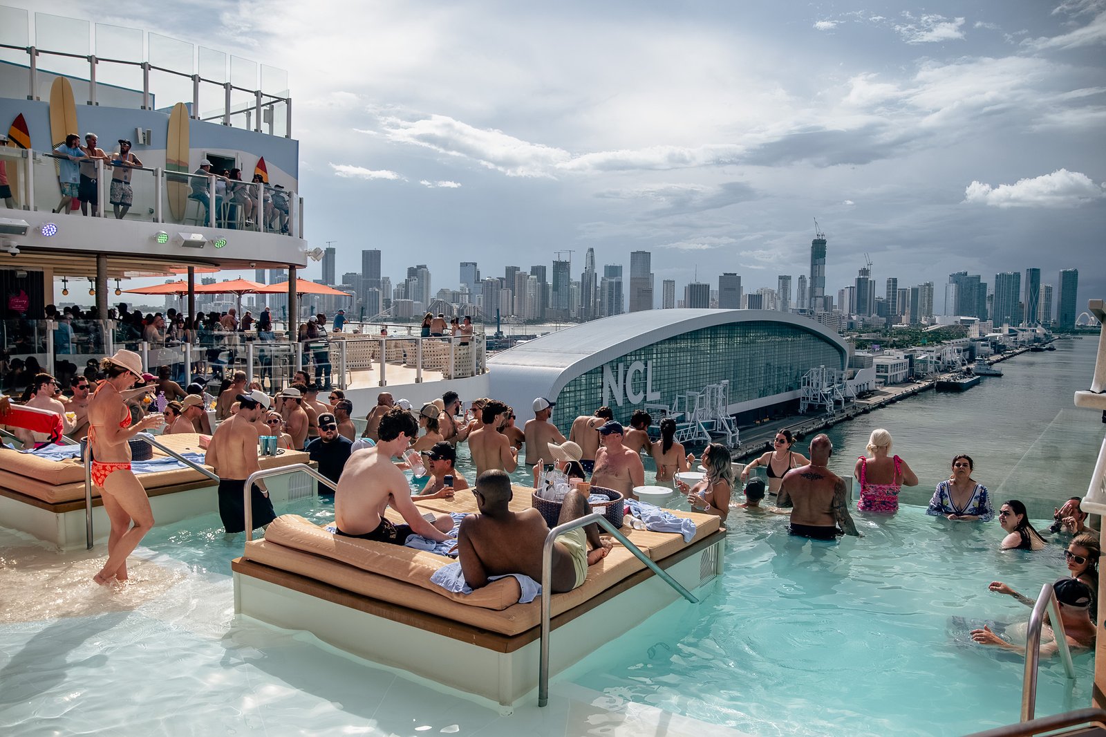 Hideaway in-water daybeds, Miami skyline behind
