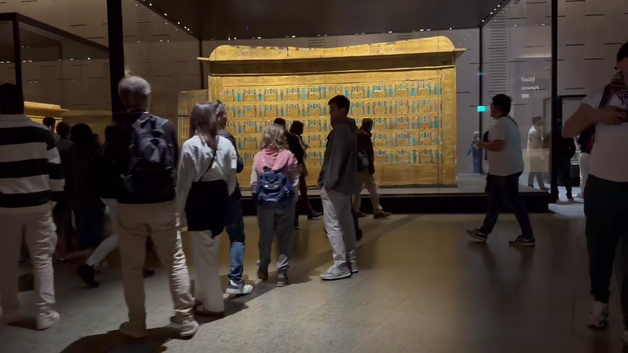 visitors filing past the great shrine in the Tutankhamun gallery
