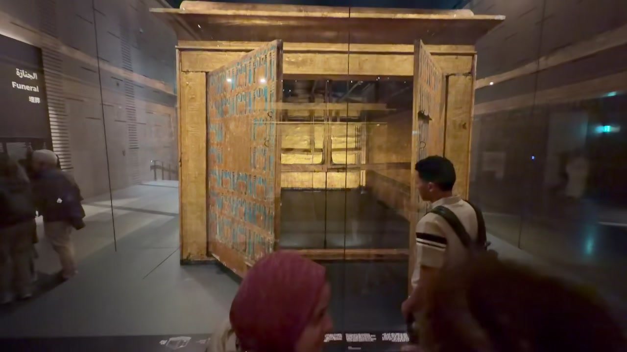 the outermost gilded shrine with its doors open